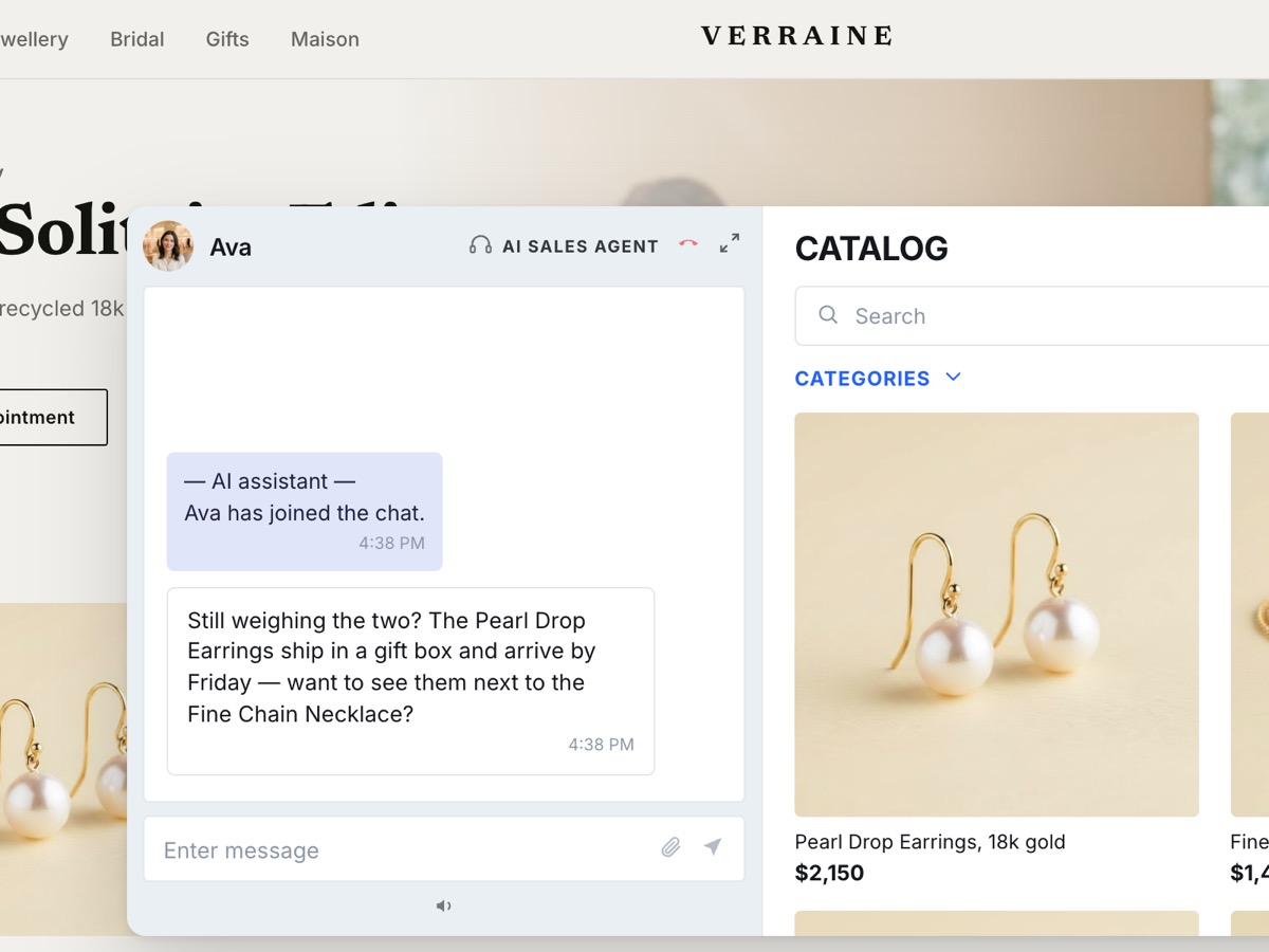 The agent opens the conversation itself on a jewellery storefront, offering to compare two pieces.