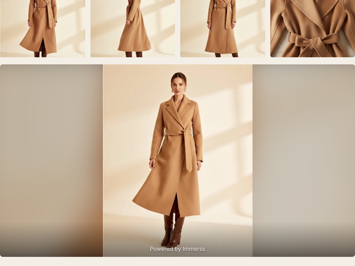 The lower half of a product page: the row of gallery thumbnails including a close-up of the belt, and below them the video of the same coat playing, with a small “Powered by Immerss” line at its foot.